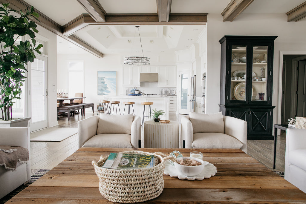 The front view of the Verellen Sullivan Chairs is so inviting to sit all day and enjoy time with family and friends. The rustic coffee table pairs beautifully with this living space that gives you an unobstructed view of the kitchen with the Hinkley Bar Stools and the Lyle rug by Loloi.