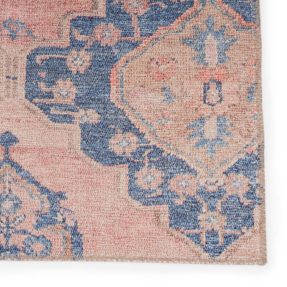 The Jaipur Living Kairos Adalee Area Rug, or KAR01, features dusty pink and blue diamond medallions with subtle distressing for a romantic, elegantly worn look. This power loomed area rug is family and pet friendly and a perfect choice for your living room, dining room, or other high traffic areas.