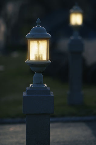 close up image of a lamp post with another lamp posts in the background