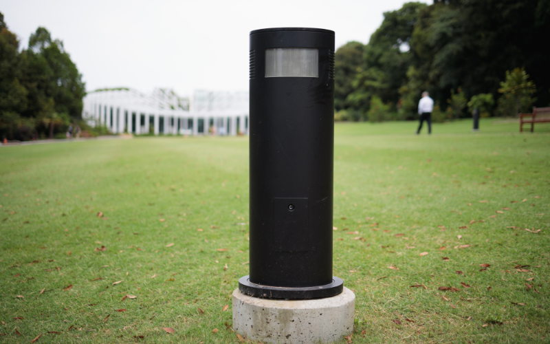 black bollard light in a park