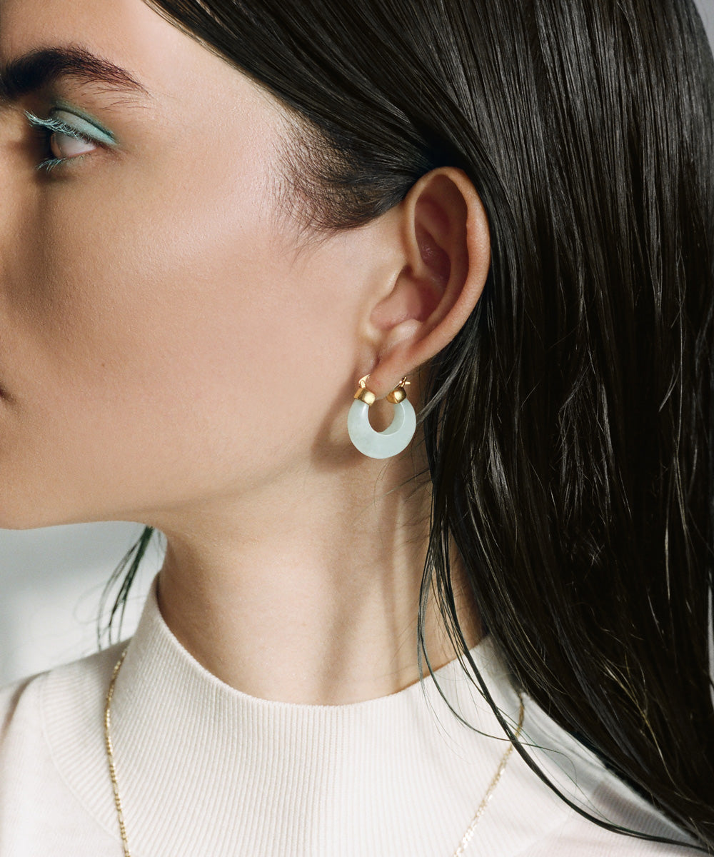 Model wearing J. Hannah Glace' Hoop earrings Aquamarine
