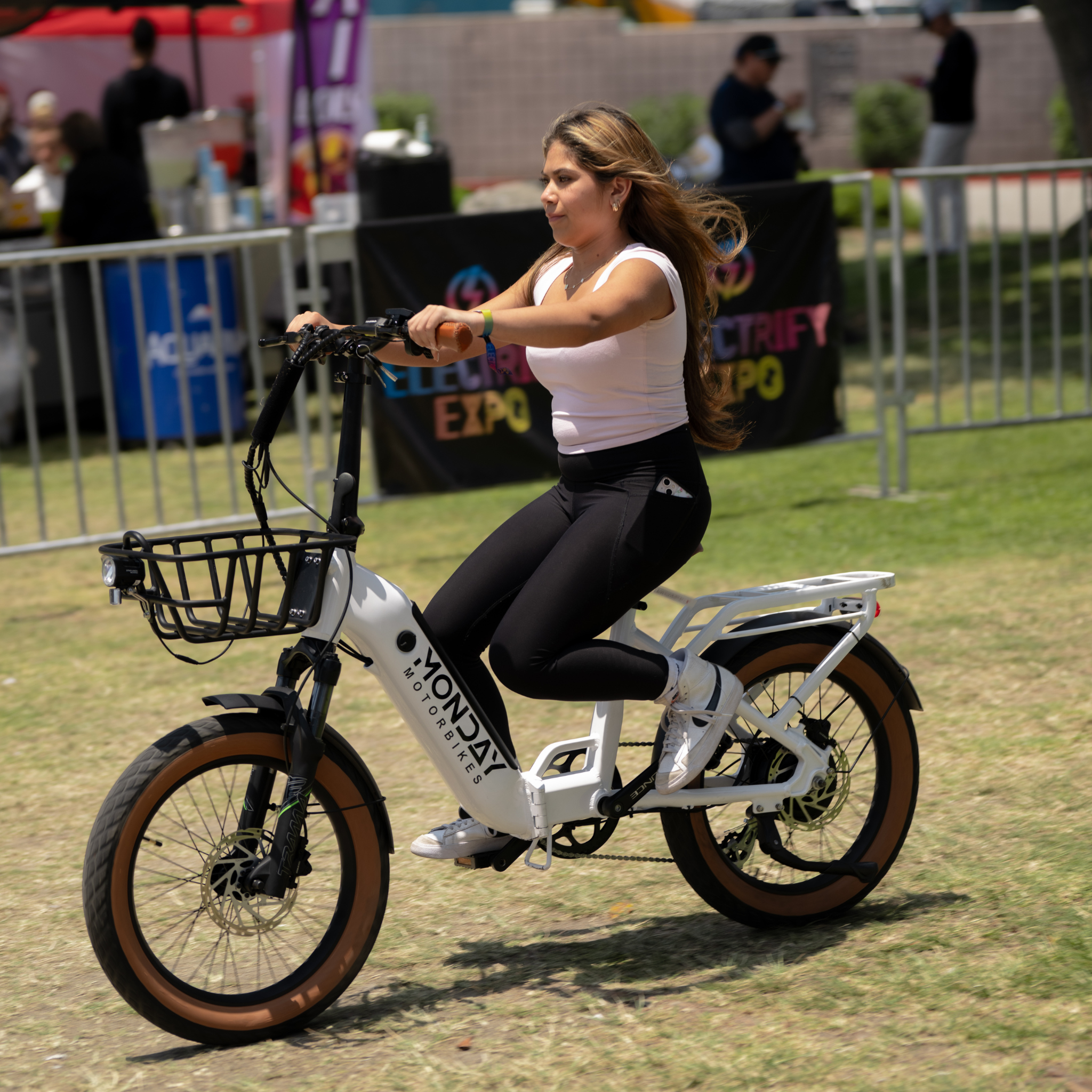 Women on Verano e-bike at Electrify Expo Monday Motorbikes