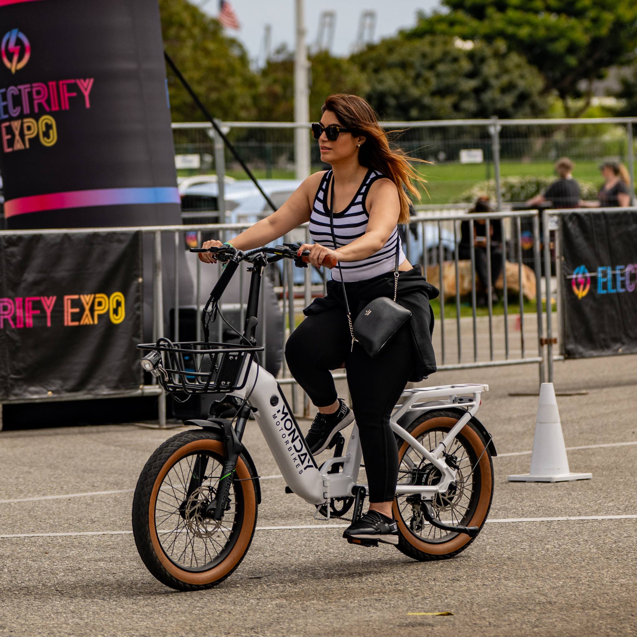 Women riding Verano e-bike at Electrify Expo Monday Motorbikes