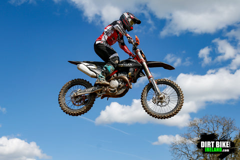 risk racing rider racing motocross in risk racing's ventilate v2 gear. The rider utilizes a a larger rear sprocket to get faster acceleration but sacrifices some top speed.