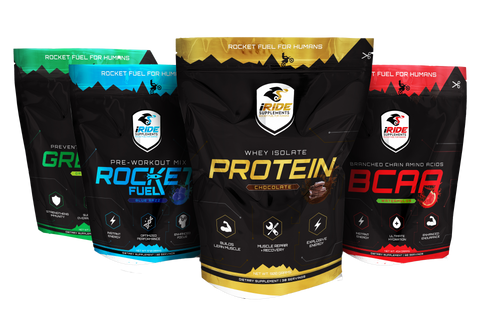 4 bag of motocross supplements by iRide including Greens, Rocket Fuel, Protein, and BCAA with a white studio background