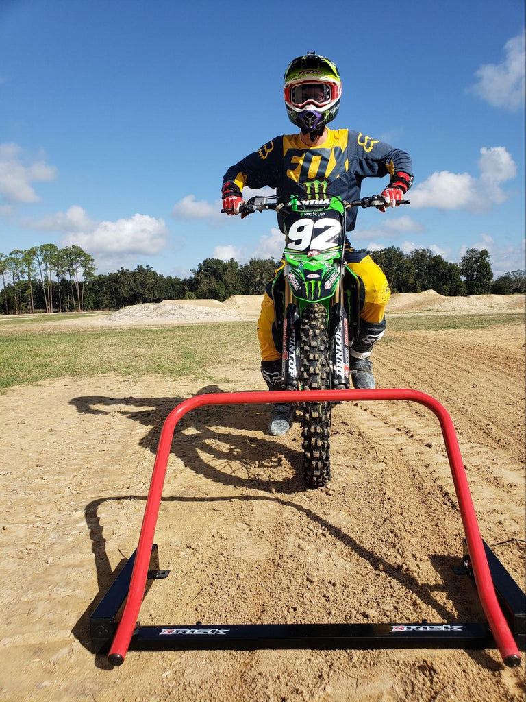 MX num 92 practicing a motostart using Risk Racings Holeshot gate