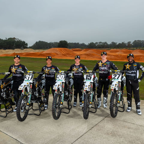 Factor rockstar energy Husqvarna team posing with their 2022 race bikes