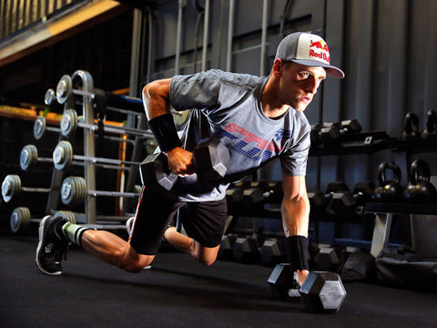 Pro motocross/supercross rider Ken Roczen working out to better his performance on the track. He is performing dumbbell rows. 