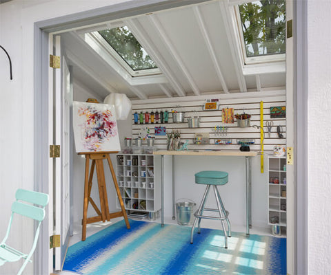 A garden shed that's been converted into an art studio