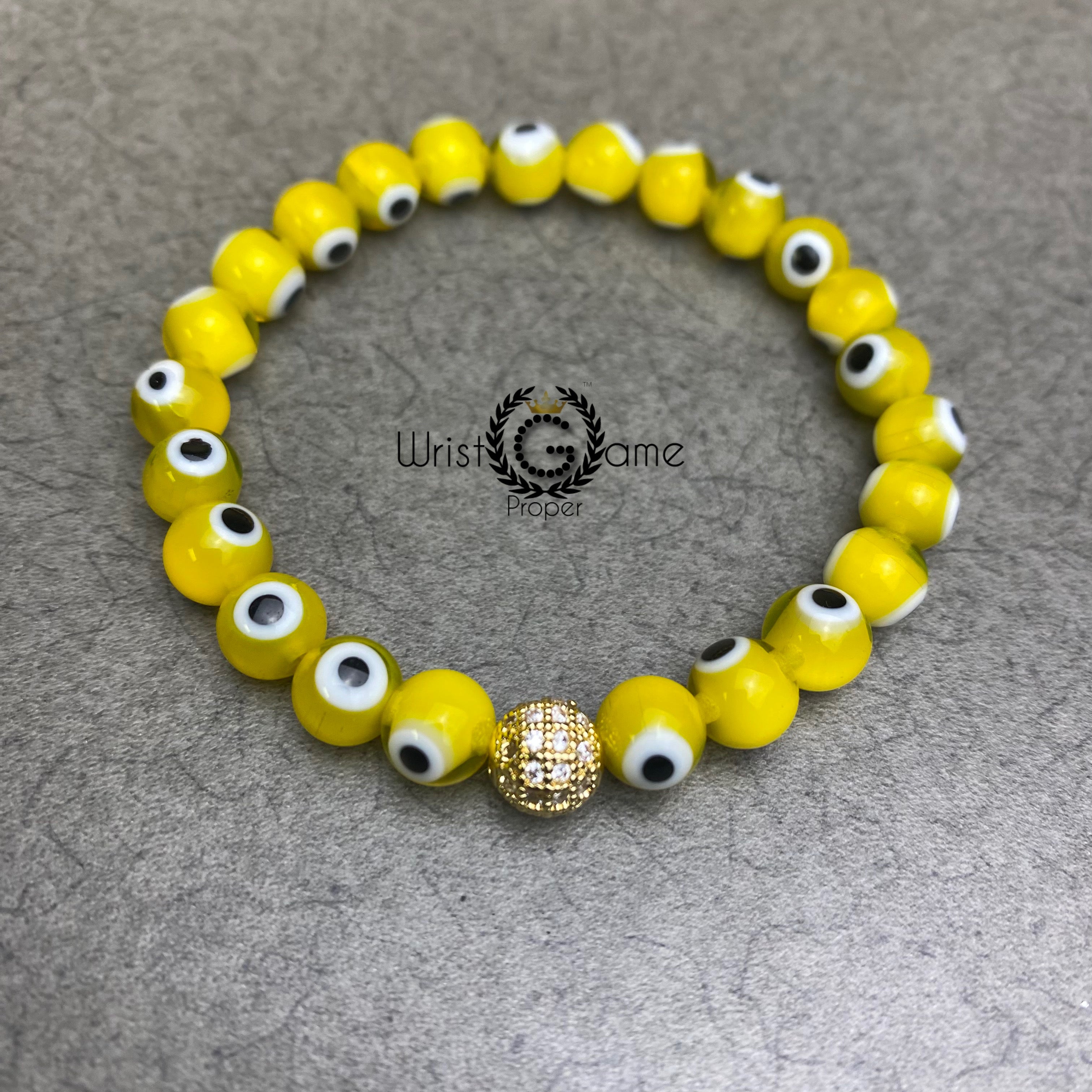 Small World_Evil Eye Yellow