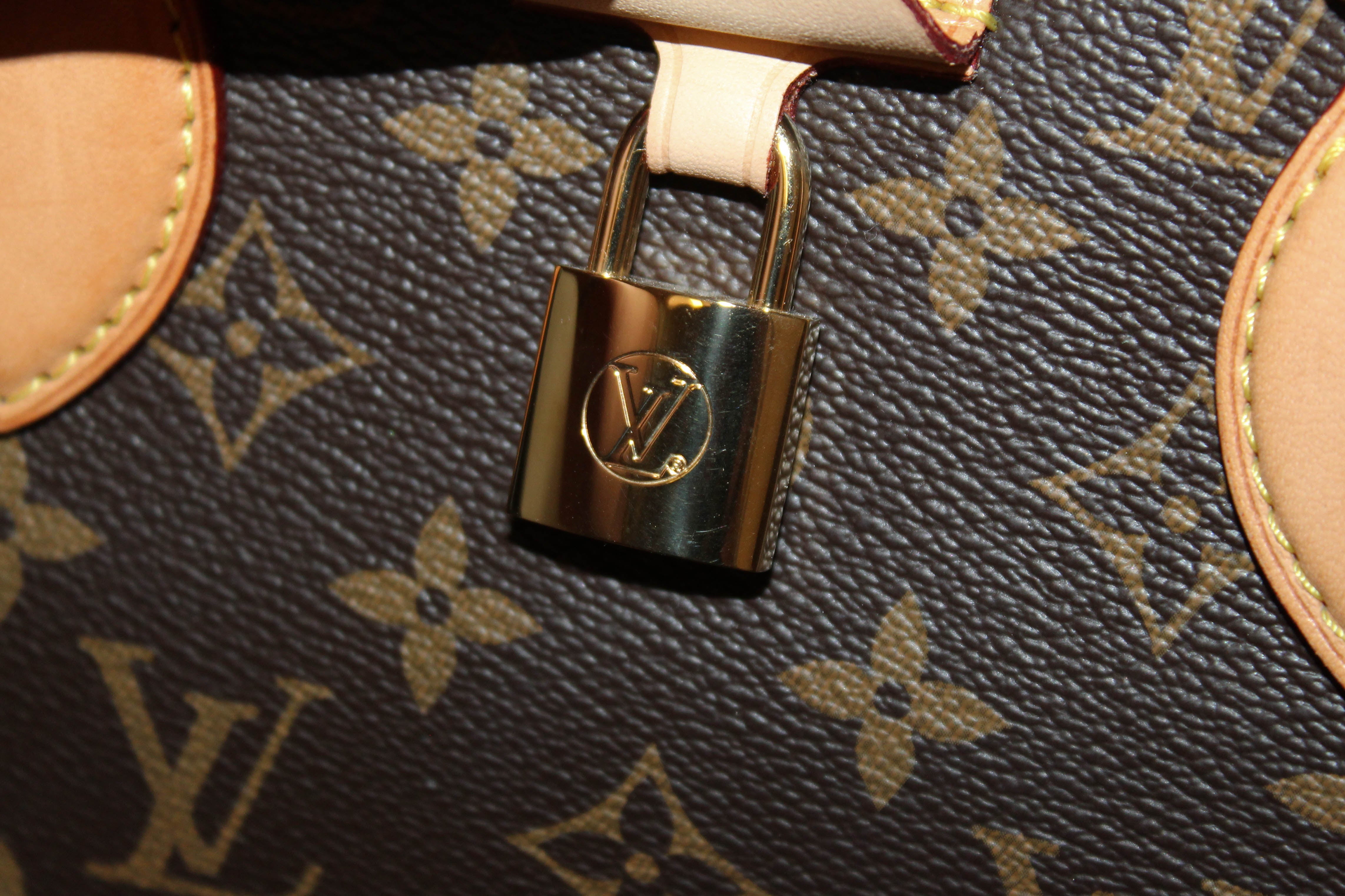 Louis Vuitton Monogram Rivoli MM Bag Brown