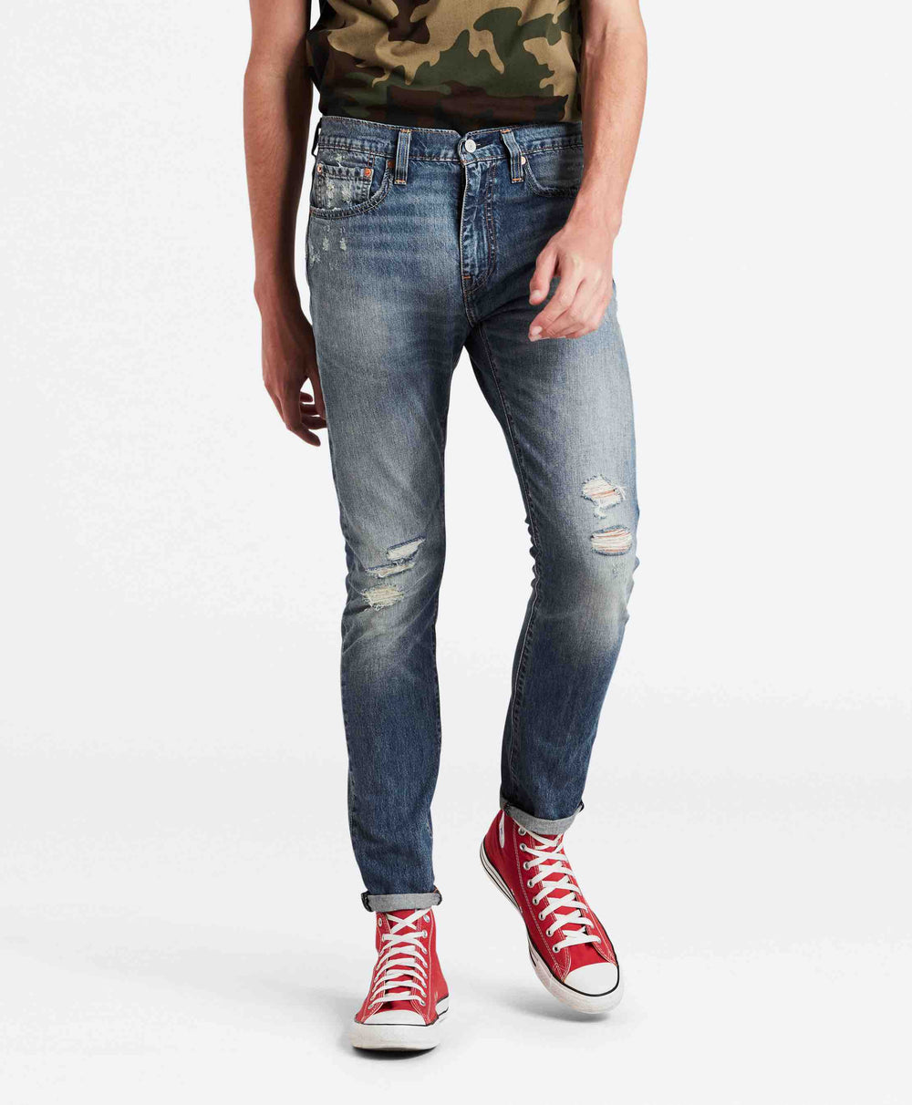 512 slim taper fit warp stretch jeans