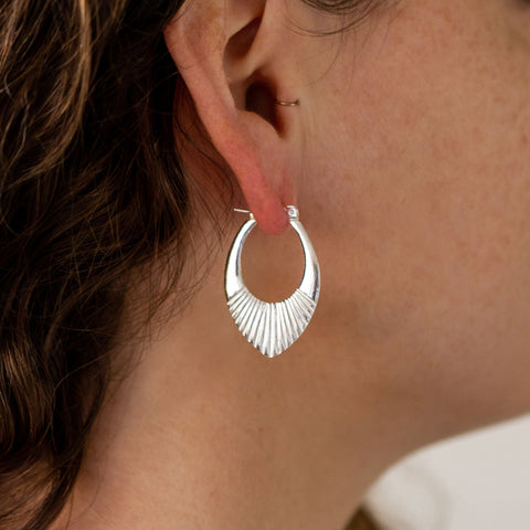 Medium Silver petal shaped sunburst hoop earrings with hinge closure