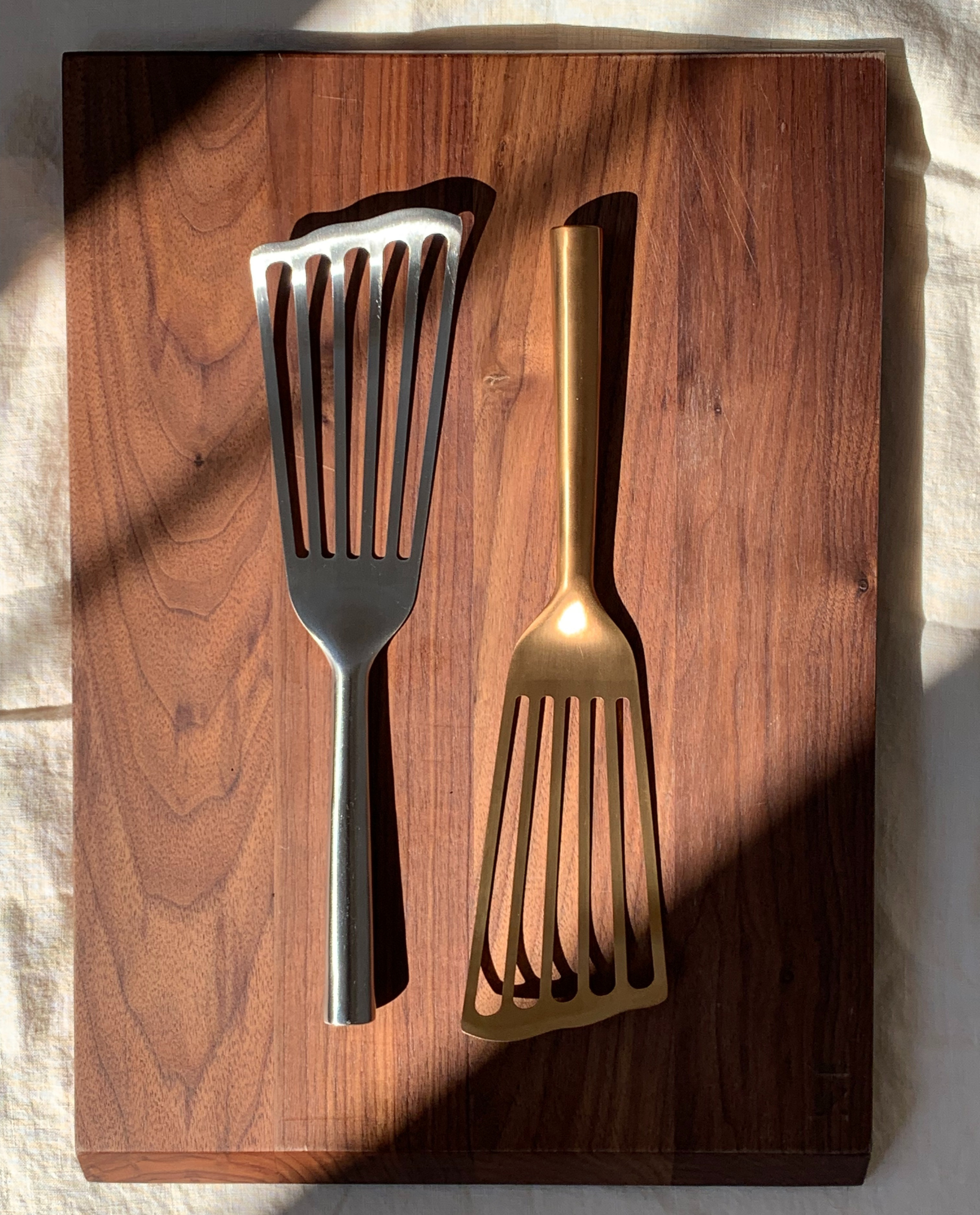 Brown colored kitchen spatula, long, narrow spatula with a