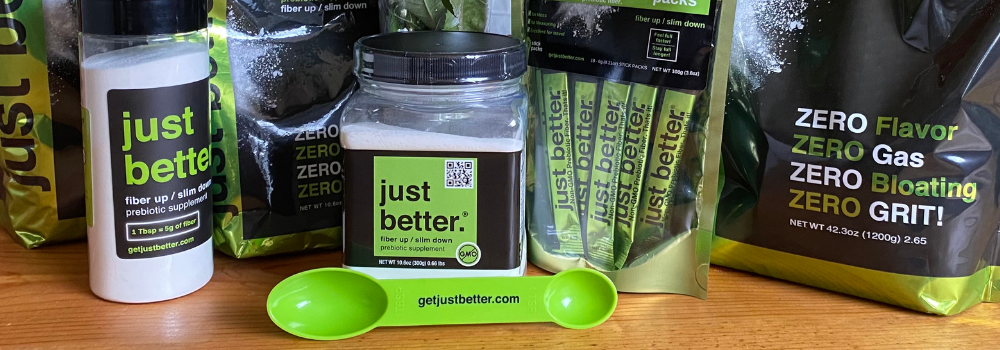 The just better.® Prebiotic Product Line on a wood surface.