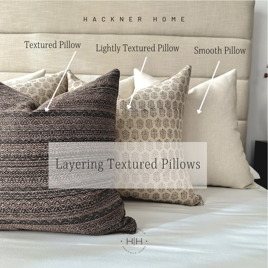 How to layer decorative pillows by size by HACKNER HOME.