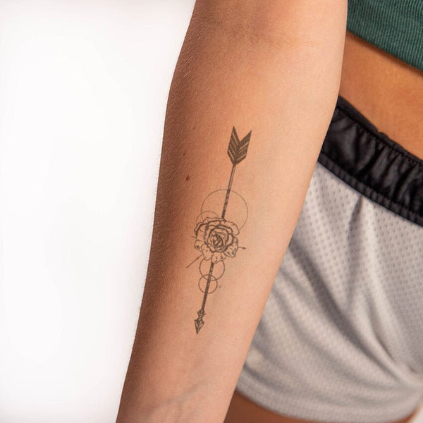 Floral arrow tattoo by Lozzy Bones  Tattoogridnet