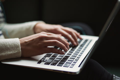 Person Typing | Photo by Kaitlyn Baker on Unsplash