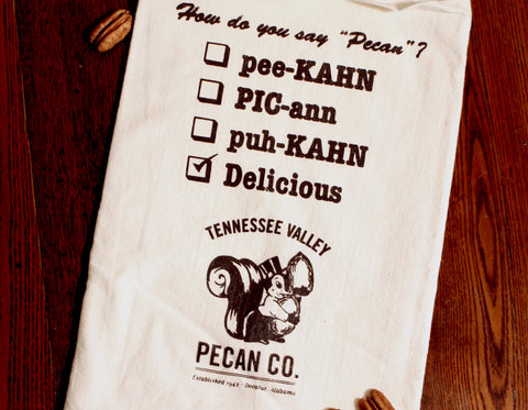 Flour sack tea towel with pecan pronunciation prints