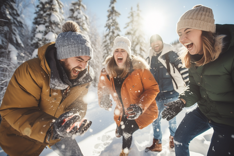 A group of friends engages in a lively snowball skirmish, filled with laughter and relishing the wintry atmosphere.