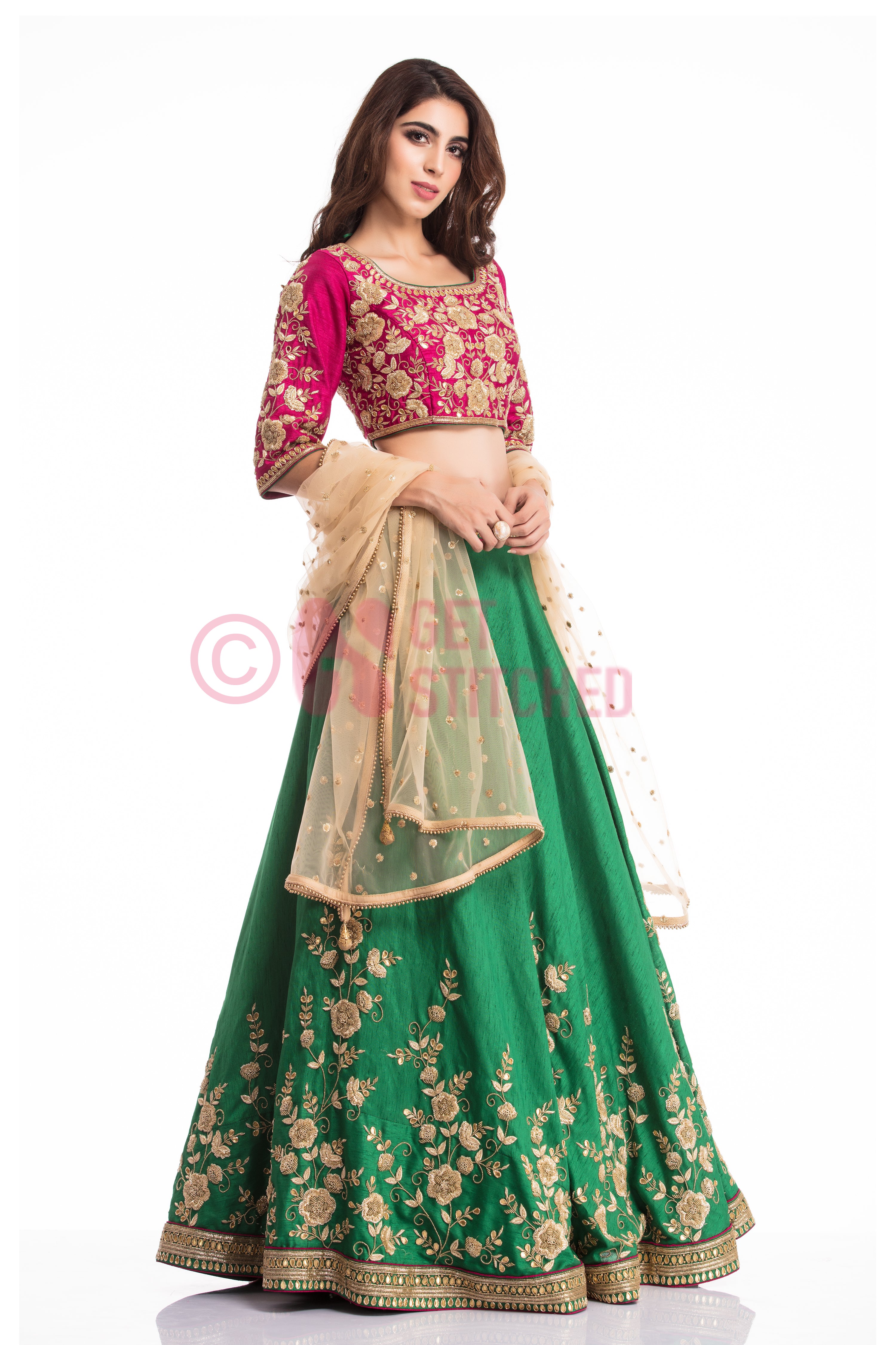 green lehenga with pink choli