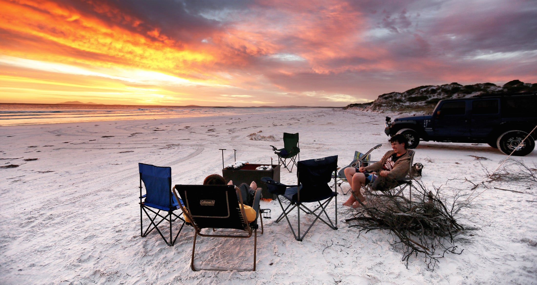 Beachside camping and campefires at night with an  Esperance Sunset.