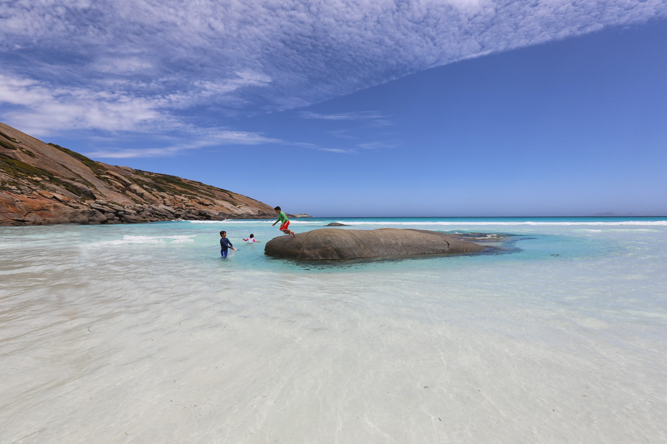 blue waters and a rock for kids to jump off - Esperance beaches at its best