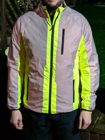 High vis & reflective cycling jacket shown worn , bright high vis