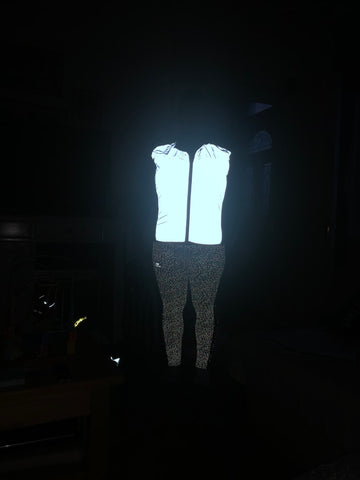 BTR Be Totally Reflective gilet shone over a motorbike jacket 