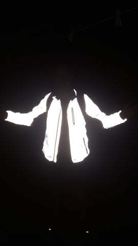 BTR Be Totally Reflective jacket in the dark with reflection!  