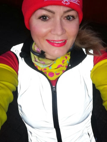 Claire wearing our ladies cut reflective gilet in size 10 - reflect bright in high vis! 