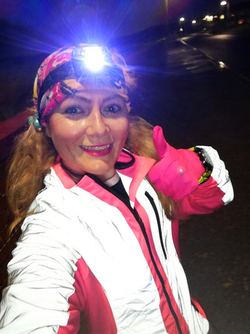 Claire wearing a BTR High Visibility Reflective Jacket in pink