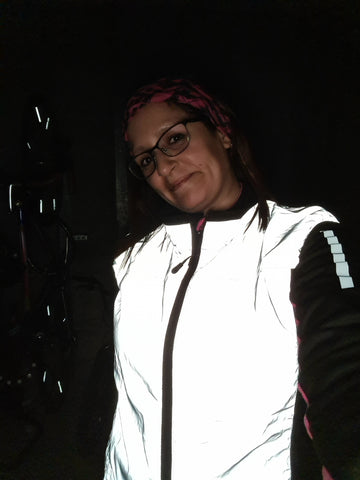 Renata wearing our Be Totally Reflective gilet in the night time - customer photos from BTR