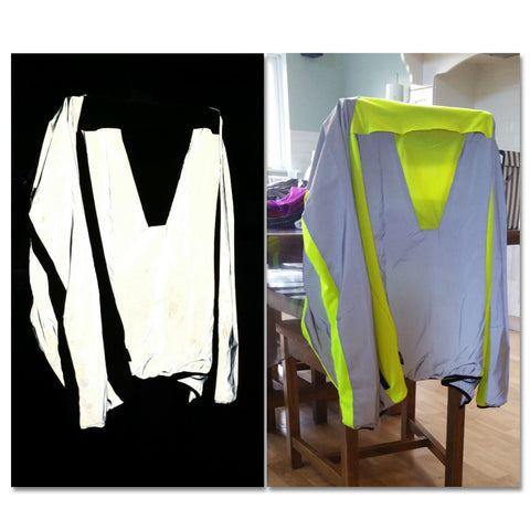 High vis yellow jacket with highly reflective panels shown in the dark with photo flash, customer review image