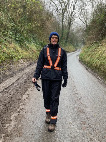 BTR orange high vis reflective sash and vest worn by a woman