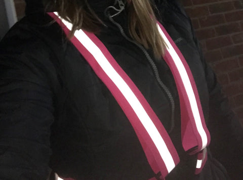 BTR pink sash worn by customer shown withe flash for reflective 