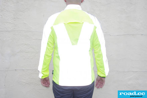 Road.cc review image of the BTR cycling & running jacket showing the back view of the jacket with reflective panels