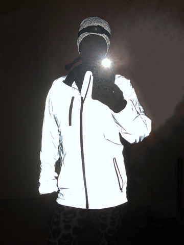 BTR high viz reflective running jacket worn by lady in the dark