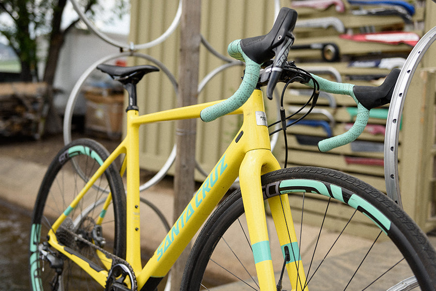 yellow santa cruz bike