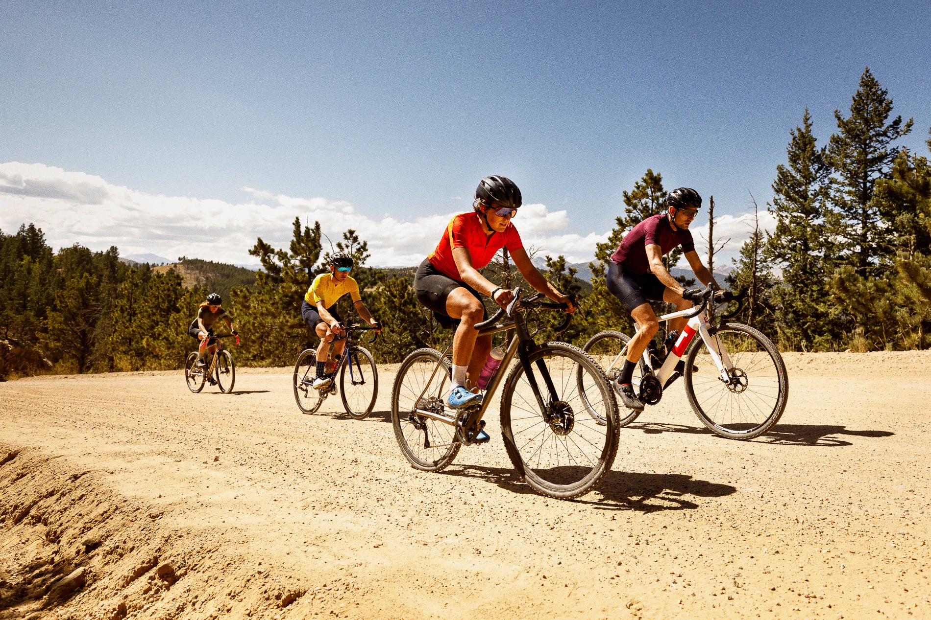 two people riding one bike