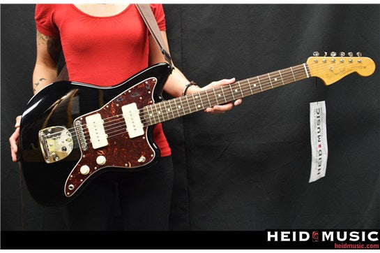 hot girl holding fender jazzmaster red shirt