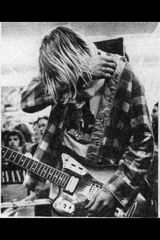 kurt in flannel rocks jaguar Seattle grunge style