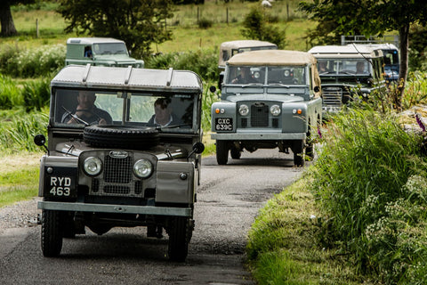 Land rovers Driving through the country side 