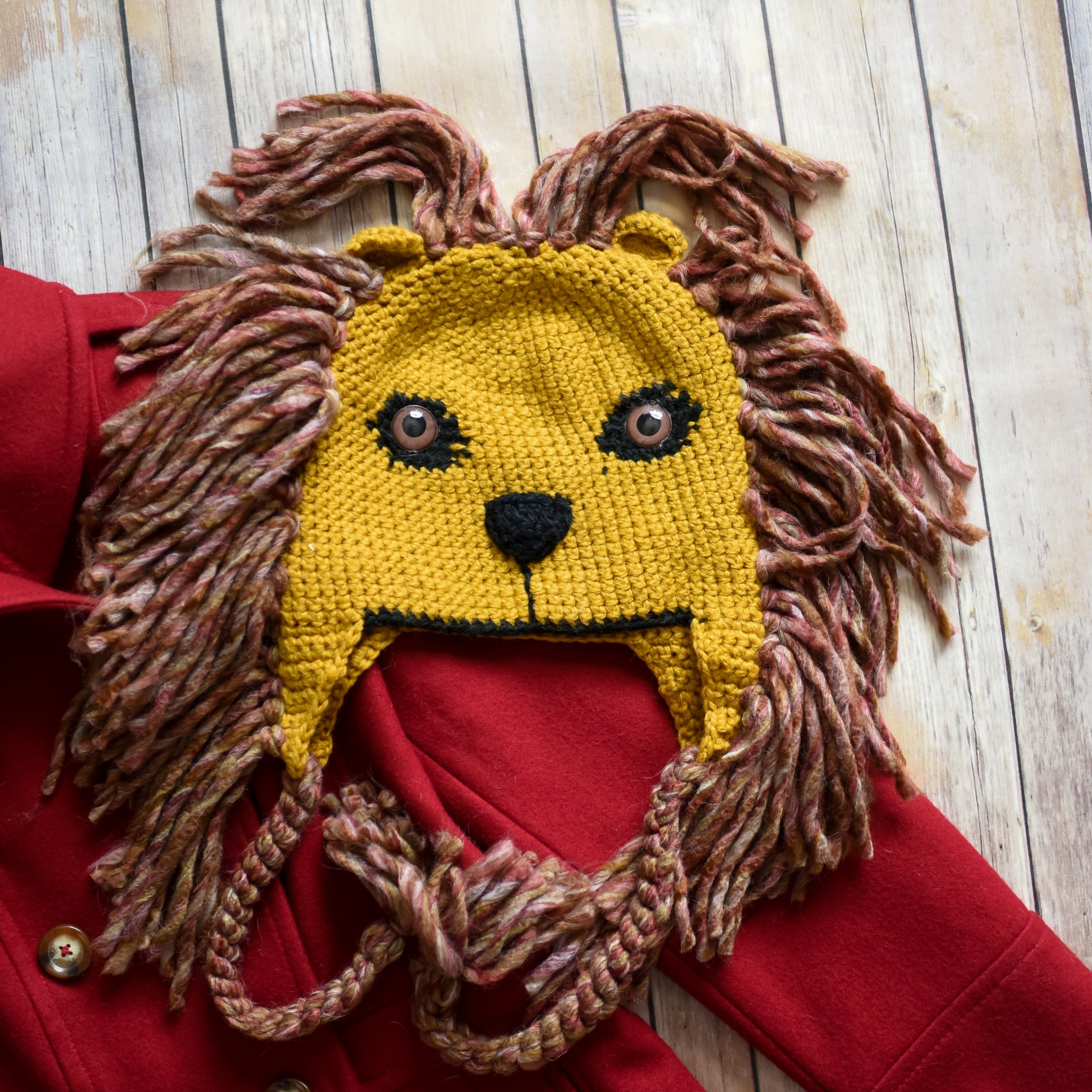 Mũ sư tử len: Trông ngộ nghĩnh và đáng yêu, mũ sư tử len là lựa chọn hoàn hảo cho những ai yêu thích trang phục độc đáo và sáng tạo. Chú sư tử đang ngủ say trên đầu bạn sẽ khiến bạn trở nên nổi bật và thu hút sự chú ý từ mọi người.
