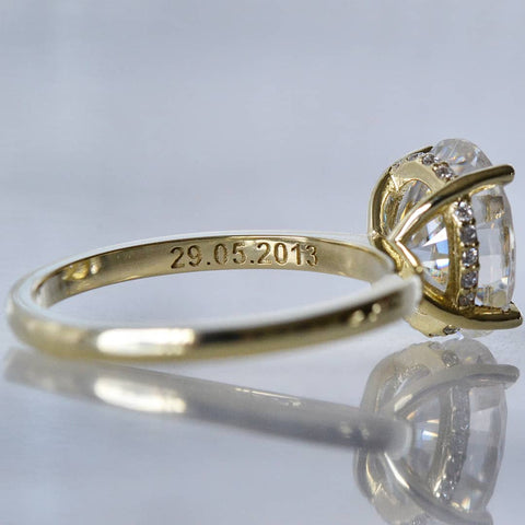 Engraved engagement ring with a date