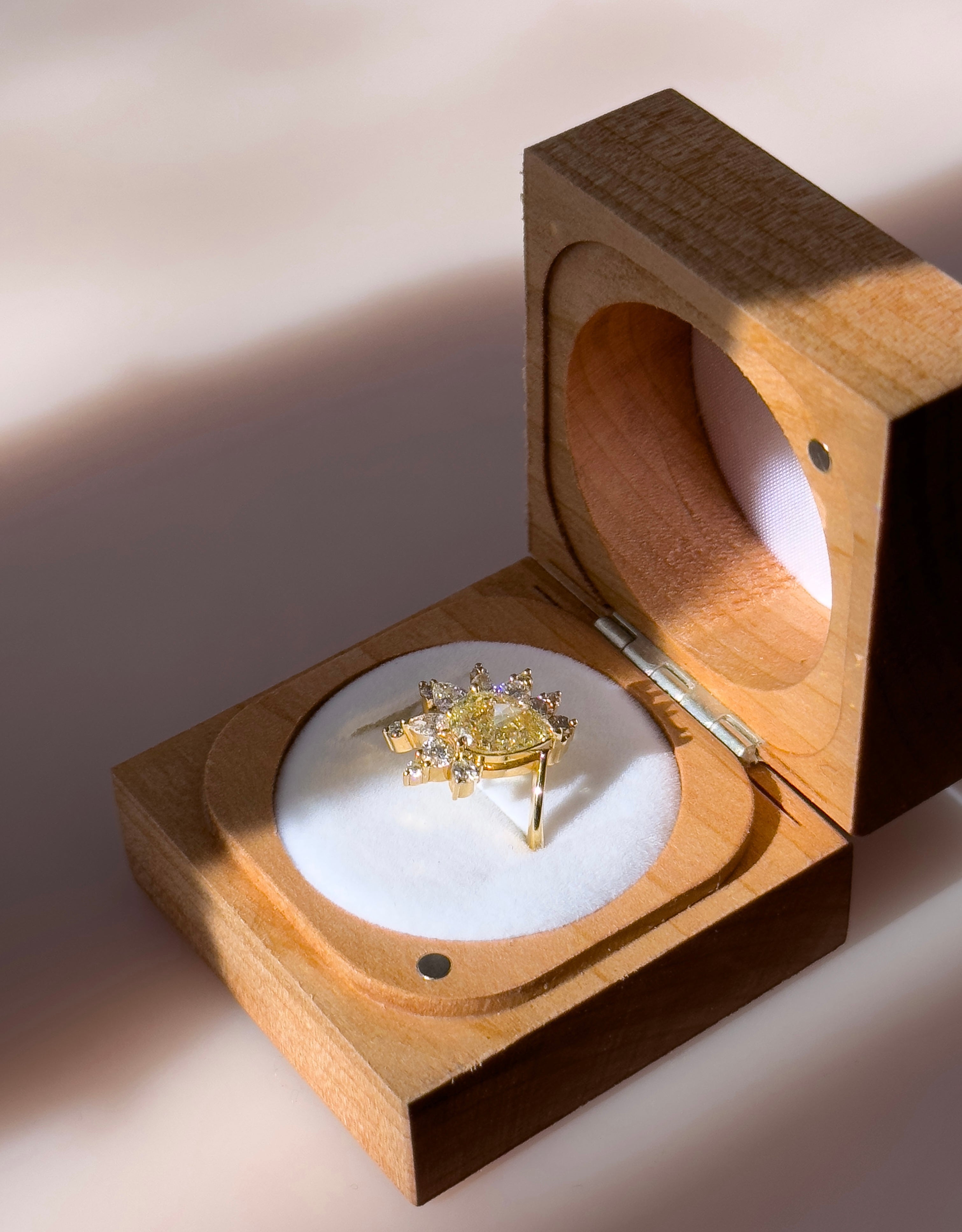 LKC's diamond ring placed inside a proposal box