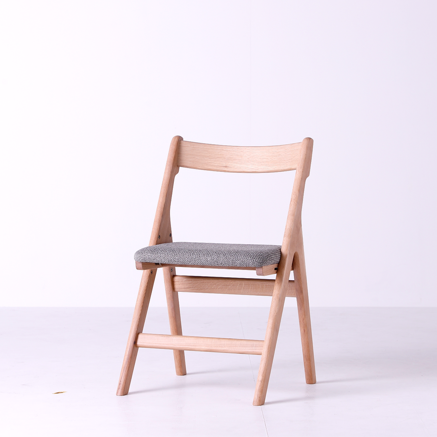 white chair with wooden arms