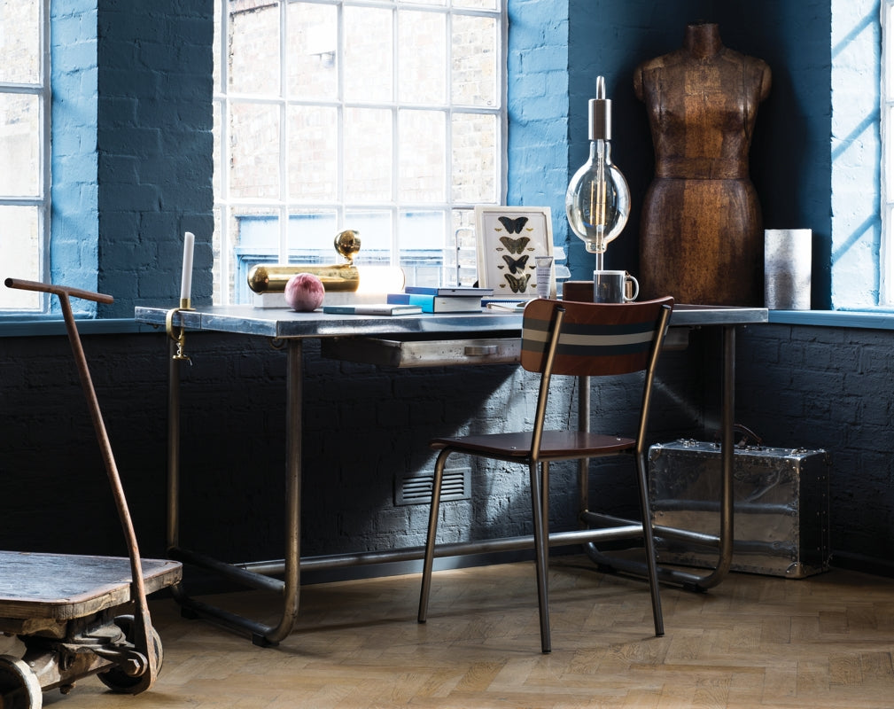 A classic school chair by Scott & Taylor featured in the Warehouse Home Apartment's home office. Photograph by David Cleveland