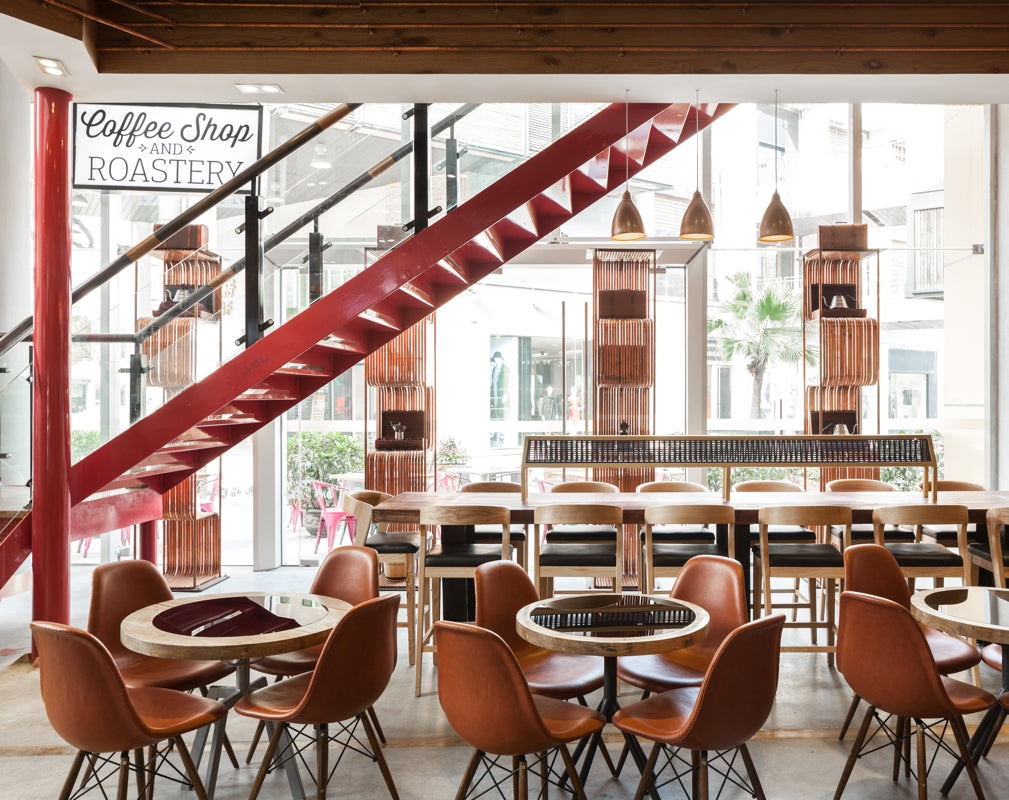 A contemporary industrial decor features in the flagship of Artisan Coffee designed by Run For The Hills