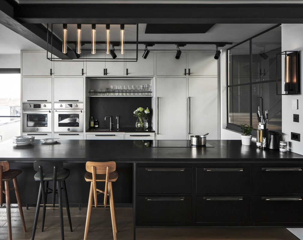 Buster + Punch CAGED lighting featured in an industrial chic kitchen
